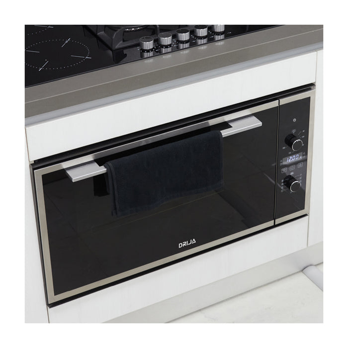 Horno eléctrico empotrable de 90cm, modelo Drija América 90 Air, en acero inoxidable y vidrio negro.