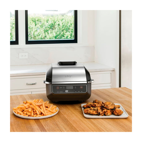 Ninja Foodi Parrilla Eléctrica 6-en-1 para Interiores | Cyclonic Grilling | Freidora de Aire | Smoke Control | Hornear, Rostizar y Asar | 1760W | Negro Plateado